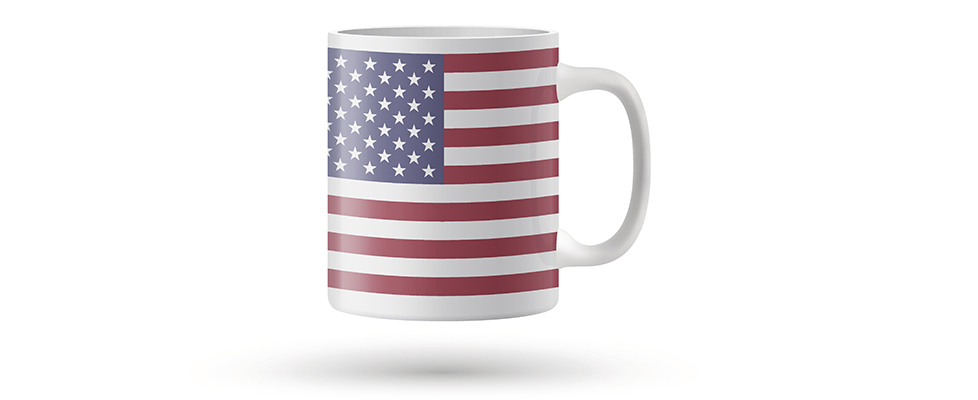 United States flag souvenir mug on white background.